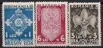 Румыния 1936 год. Скаутский лагерь. Нагрудные значки скаутов. 3 марки с наклейкой